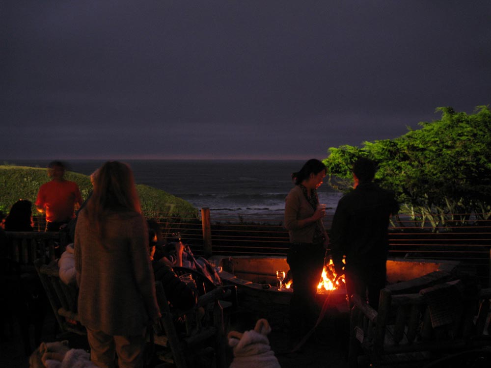 oceanfront restaurant patio evening fire pits