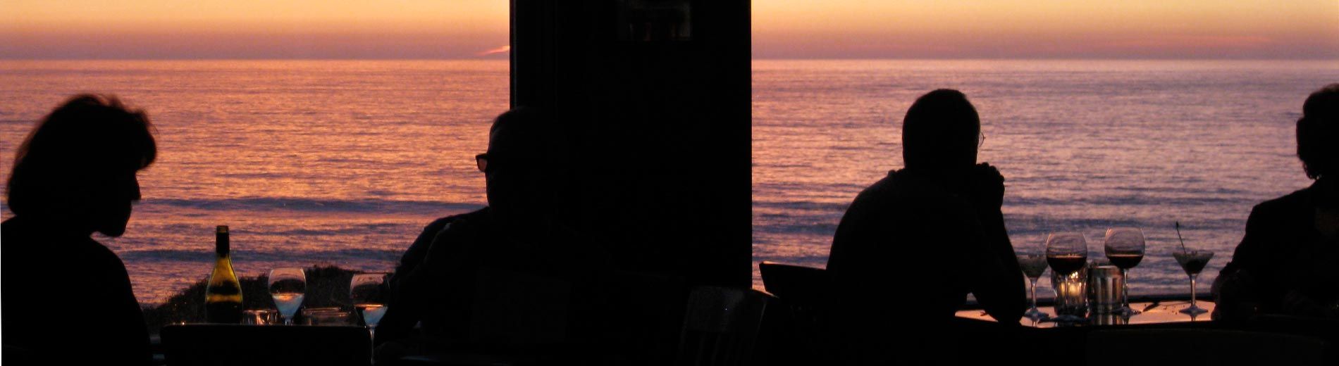 Moss Beach Distillery ocean view restaurant dining room sunset